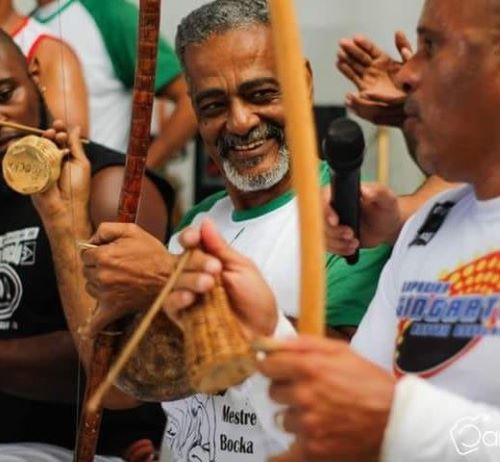 Mestre Bocka playing his berimbau, the musical bow used for Capoeira.
